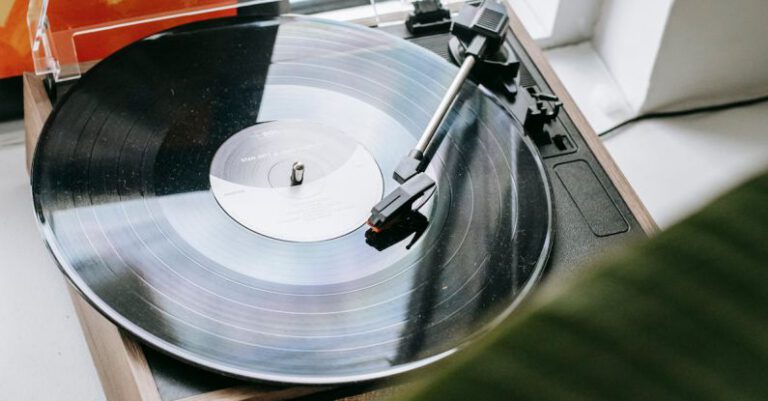 Playlists - Vintage record player with disc placed on windowsill