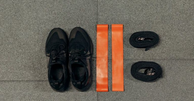 Workout Programs - Black Sneakers On Gray Concrete